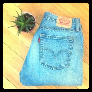 Levi's 501 Distressed Jeans.